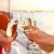Happy friends with glasses of champagne on yacht. Vacation, travel, sea and friendship concept. Closeup.